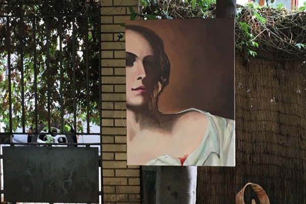 Home the display of art is taking place in a public garden in paris.2