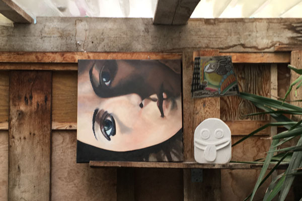 Home the display of art is taking place in a public garden in paris.